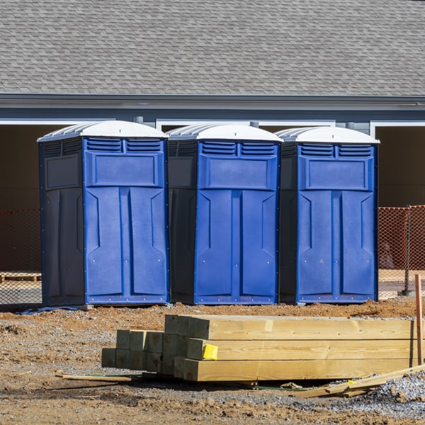 what is the cost difference between standard and deluxe portable toilet rentals in Davis